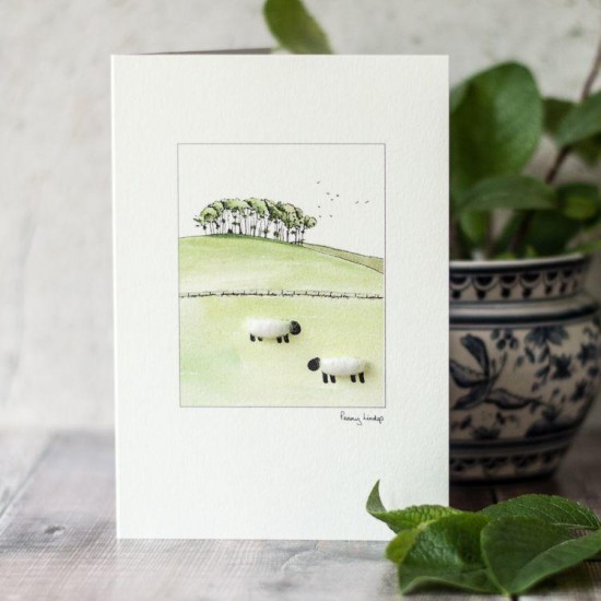 Sheep under copse on hill card