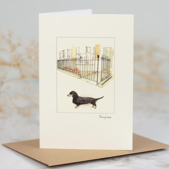 Dachshund by city garden railing card