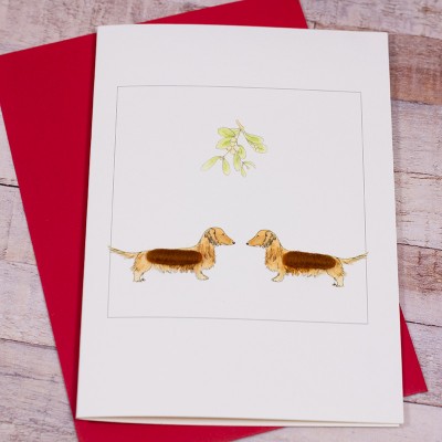 Red Dachshunds under the Mistletoe Red Dachshunds under the Mistletoe