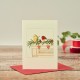 Robin on mantelpiece Christmas card