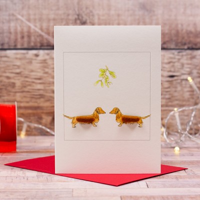 Red Dachshunds under the Mistletoe Red Dachshunds under the Mistletoe