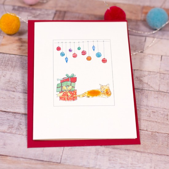 Ginger cat under baubles Christmas card