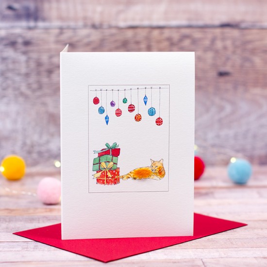 Ginger cat under baubles Christmas card