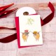 Mini Highland cows under the Mistletoe Christmas card