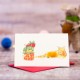 Mini ginger Cat and presents Christmas card