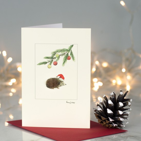 Hedgehog with hat under pine sprig Christmas card