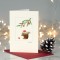 Squirrel with hat under pine sprig Christmas card