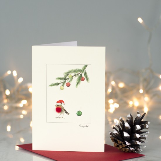 Robin with hat under pine sprig Christmas card